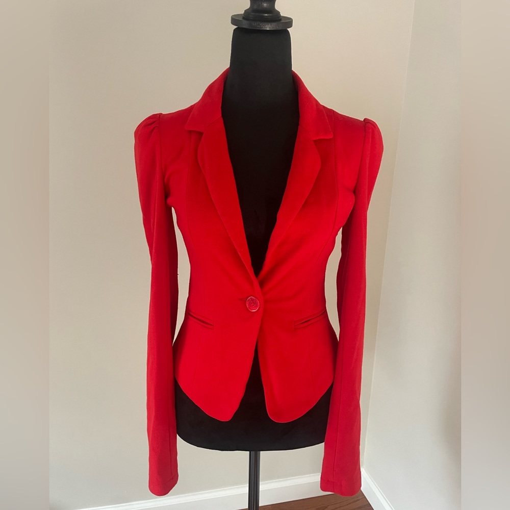 Red Blazer *offers welcome*